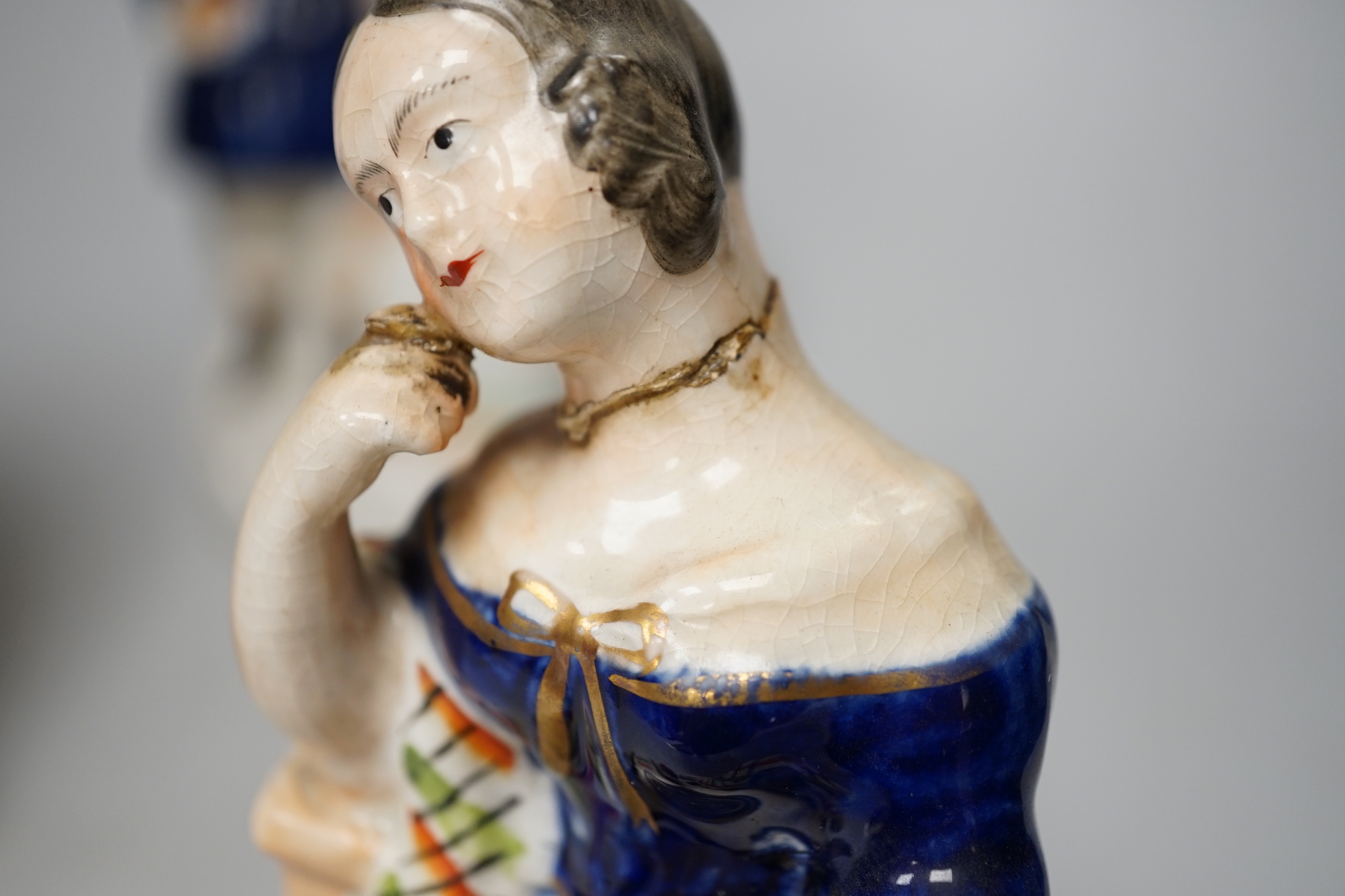 Eleven Staffordshire flatback figures